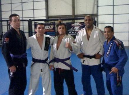 Urijah Faber getting his purple belt from Prado in 2010