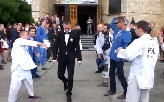 (Video) At Church Wedding, Polish BJJ Player Is Belt Whipped By Teammates