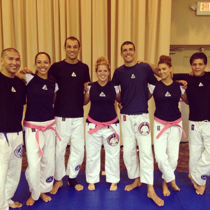 Whitney Fetters (in center) with Ryron and Rener Gracie
