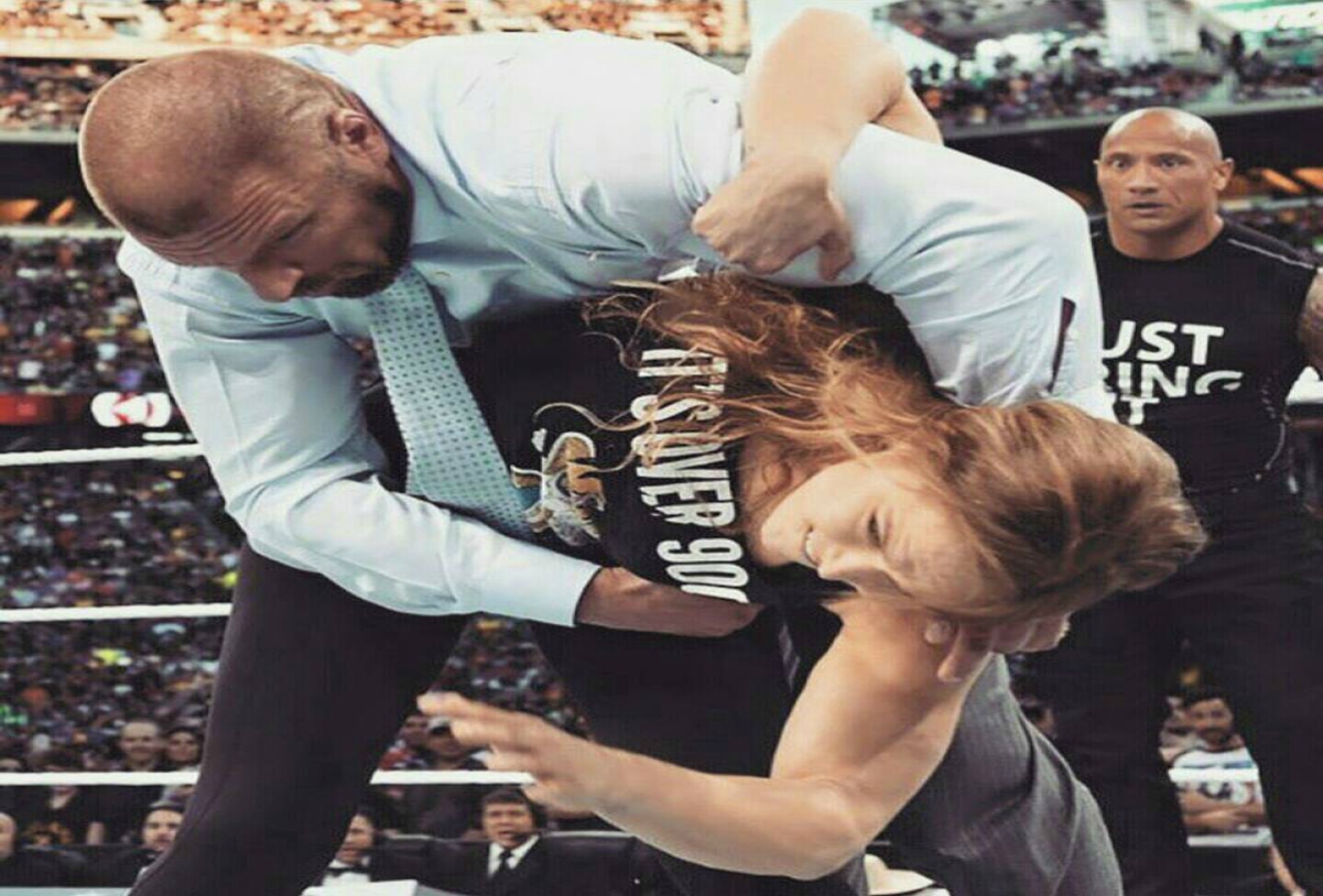 Watch: Ronda Rousey at WWE’s Wrestlemania Throws Triple H & Stephanie McMahon