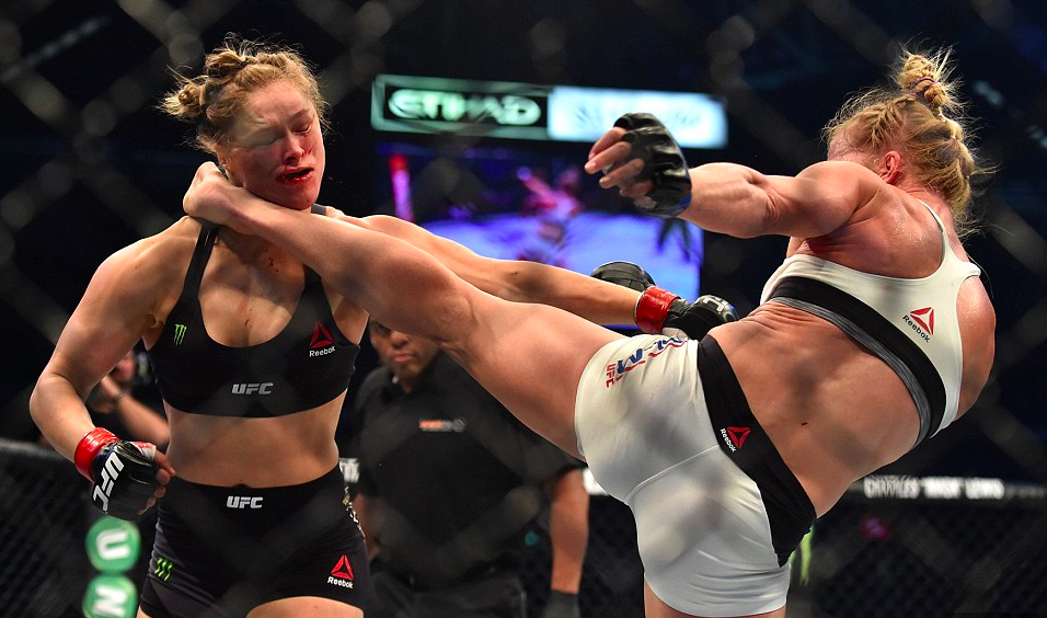 (Video) Holly Holm Demonstrates Rousey Head Kick on ‘Kelly and Michael’