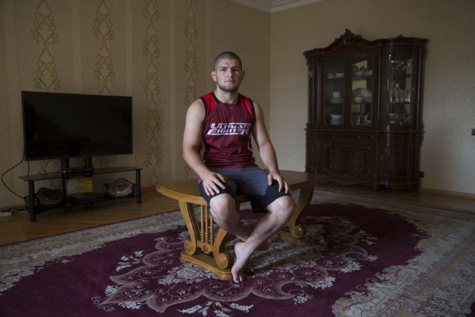 Dagestani local Khabib Nurmagomedov in his home during Ramadan in Makhachkala. Born September 20, 1988 Khabib is a Russian undefeated mixed martial artist. He is a multiple time Combat Sambo World Champion and a Judo black belt who is currently fighting in the lightweight division for the Ultimate Fighting Championship (UFC). He currently holds one of the longest undefeated streaks in MMA with 22 straight wins. He is currently the #3 contender in the UFC Lightweight division and the #3 Lightweight in the world. Fighting is embedded in to the culture of Dagestan and it is renowned around the world for producing large numbers of great fighters from wrestlers to mixed martial arts. The Russian government in Moscow also sends large amounts of funding to help train such fighters. Located in the North Caucasus, bordering the Caspian Sea and a Republic of Russia, Dagestan is home to almost 3 million mostly muslim people. Ethnically very diverse, it is made up of several dozen ethnic groups and is Russia's most heterogeneous republic, where no ethnicity forms a majority. From 2000 until late 2012 Dagestan was subject to a violent Islamic separatist movement that spilled over from neighbouring Chechnya but has now been largely controlled by the Russian Government.