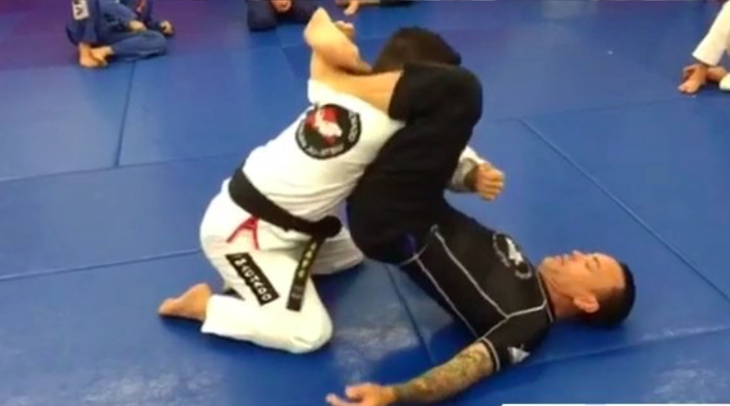 Eddie Bravo Demonstrates Effectiveness of the  Rubber Guard On Gi Wearing Opponent