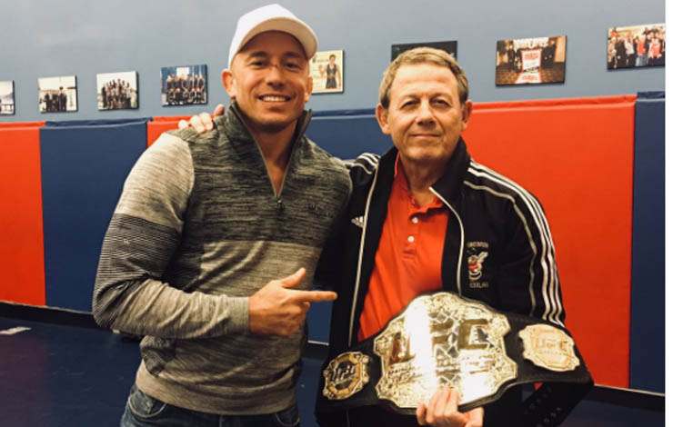 Georges St-Pierre Gives Away his UFC belts After Every Win, Bisping Win Went To Wrestling Coach