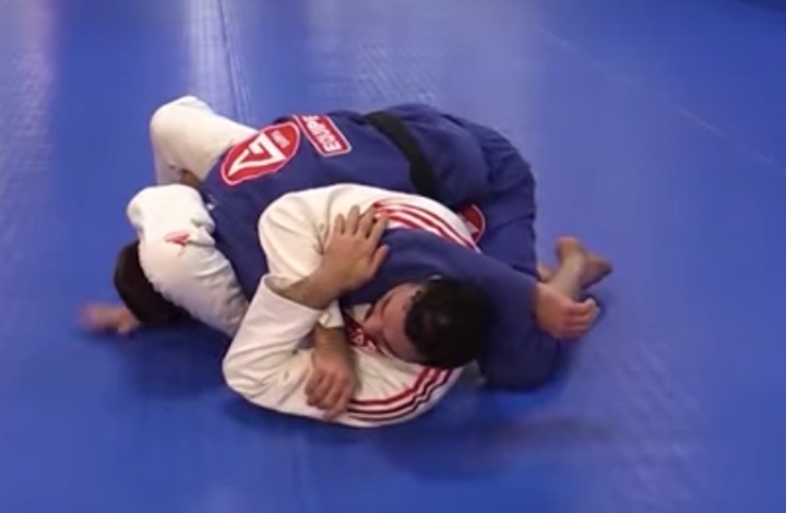 Braulio Estima Shows A Sneaky Triangle Choke from Bottom Side Control