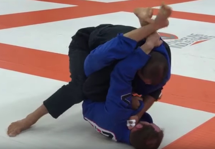 Black Belt Puts Himself in a Triangle To Better Take The Back and Submit