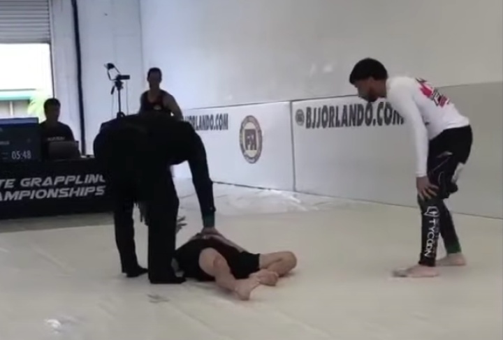 Woops. My Bad Bro… Guy Knocks Opponent Out with Imanari Roll in Competition