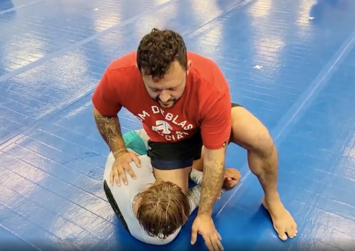 Deceive Your Opponent with a Back Step, Then Immediately Enter a Knee Slice Pass with Tom DeBlass